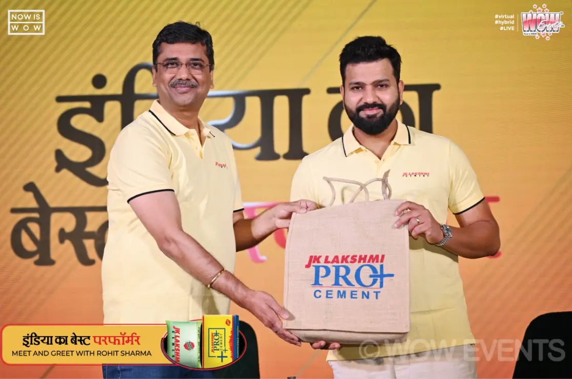 Rohit Sharma receiving a JK Lakshmi Pro+ Cement package