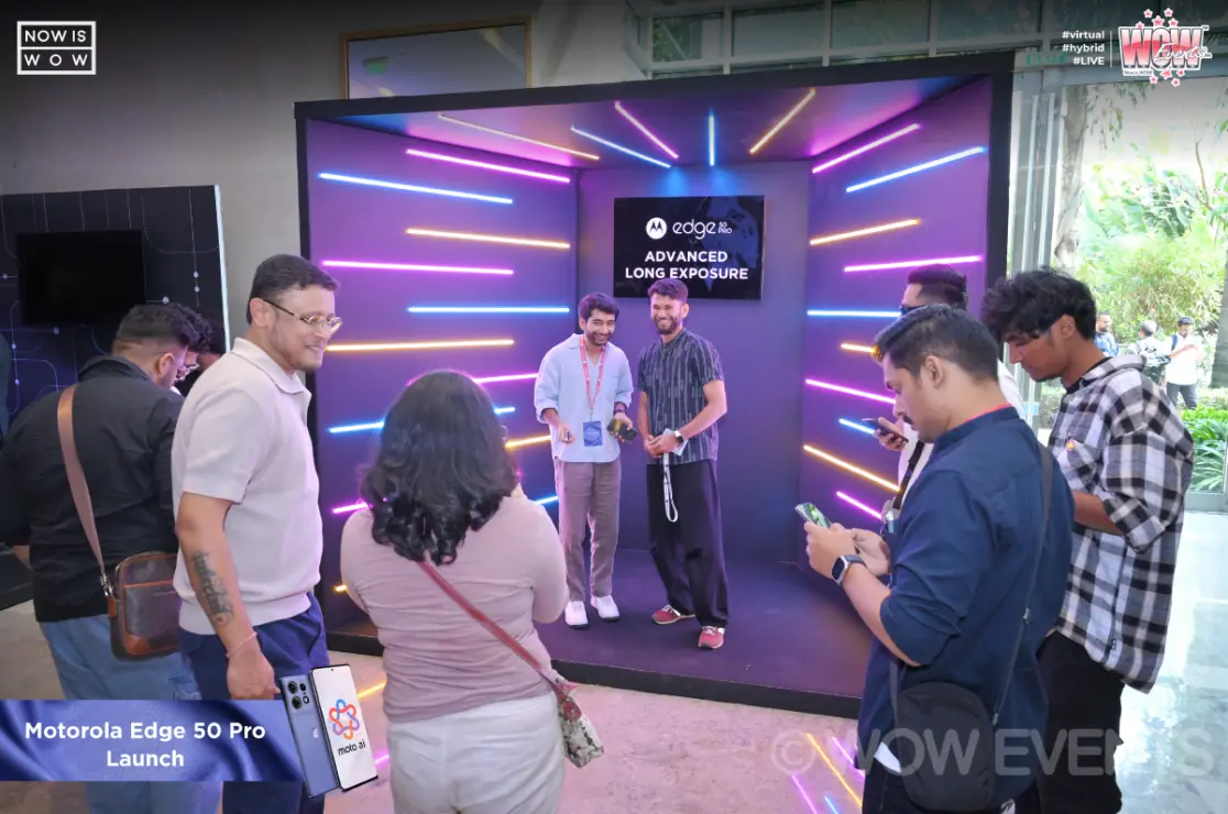 Guests at a Motorola Edge 50 Pro camera experience booth