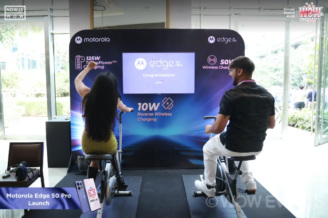 Visitors at a Motorola Edge 50 Pro charging demo zone