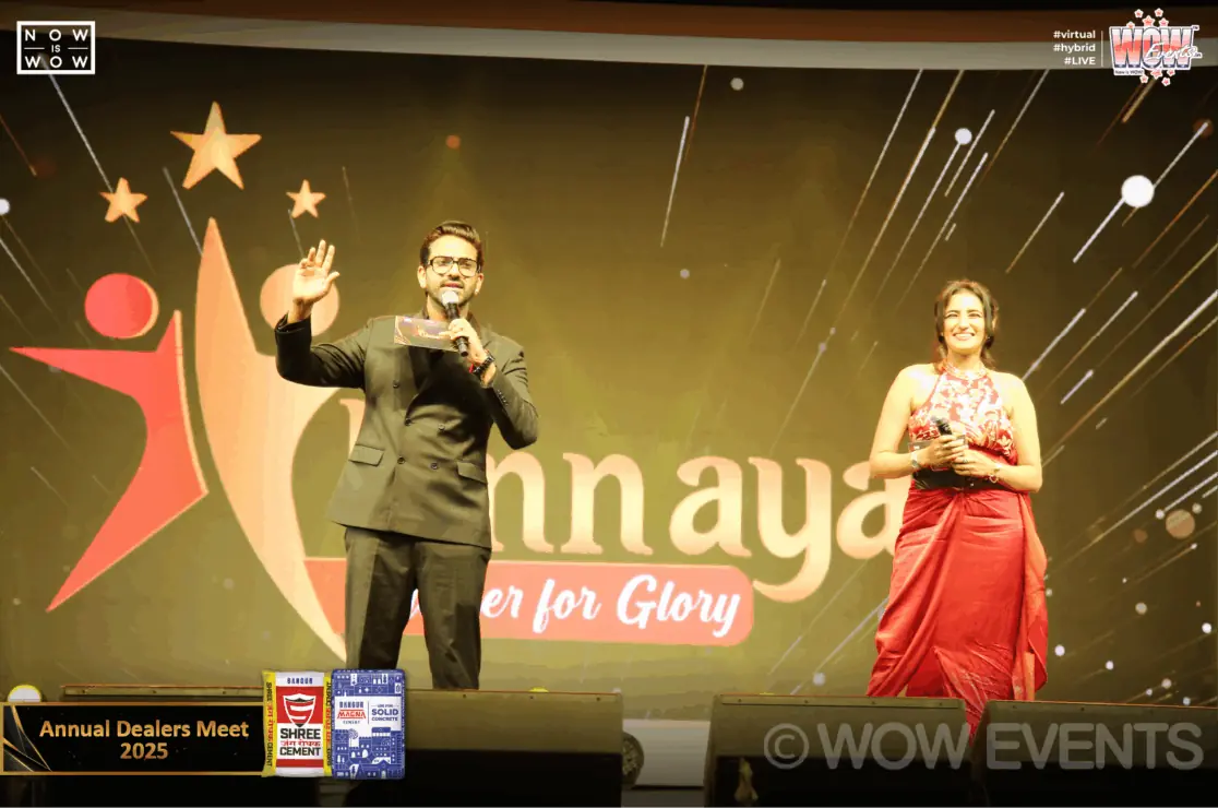 Hosts on the Unnayan stage at the Shree Cement dealers meet