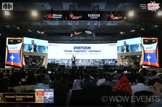 Shree Cement event audience facing a wide stage screen