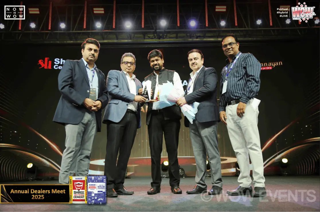 Award presentation on stage at the Shree Cement dealers meet