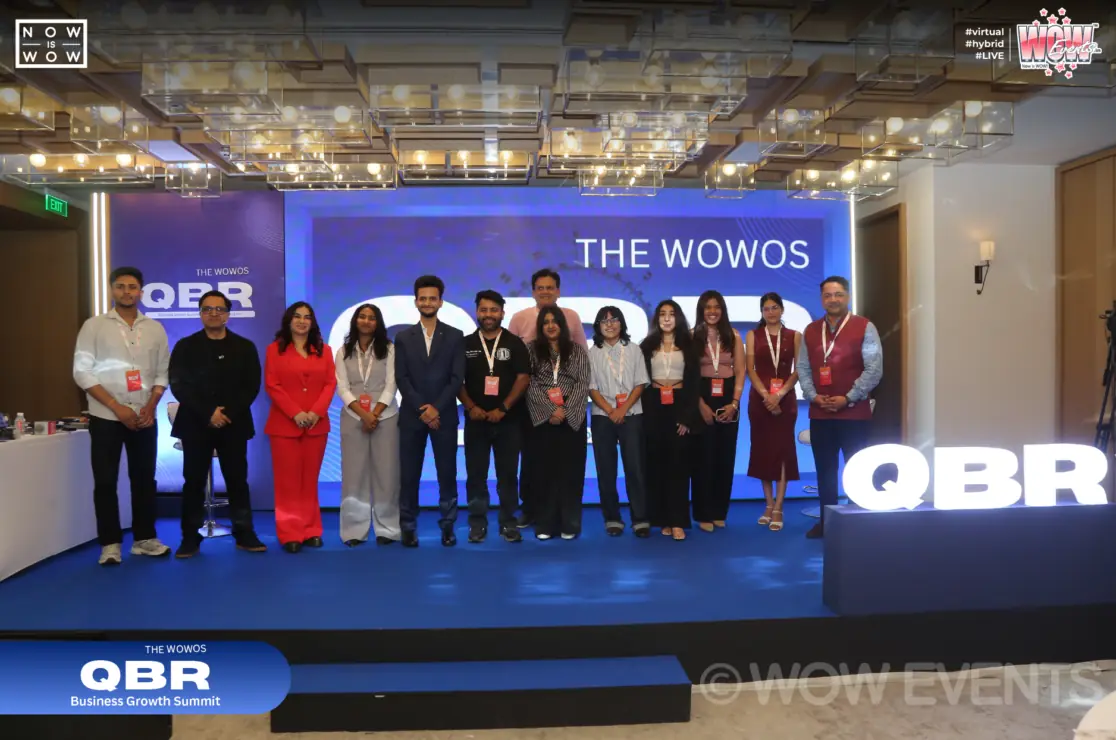The WOWOS QBR conference team on stage