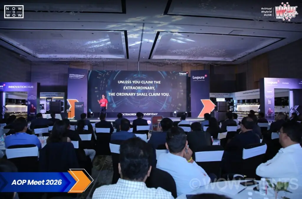 Livpure AOP Meet 2026 audience facing a wide stage screen