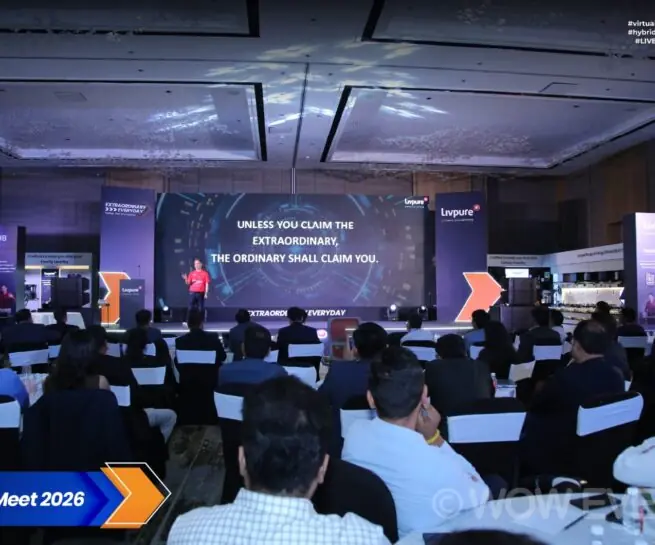 Livpure AOP Meet 2026 audience facing a wide stage screen