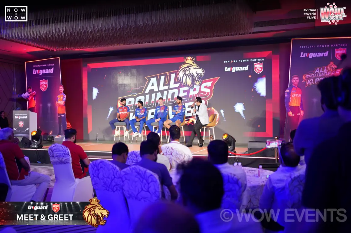 Livguard All Rounders Ki Power event hall with stage screen