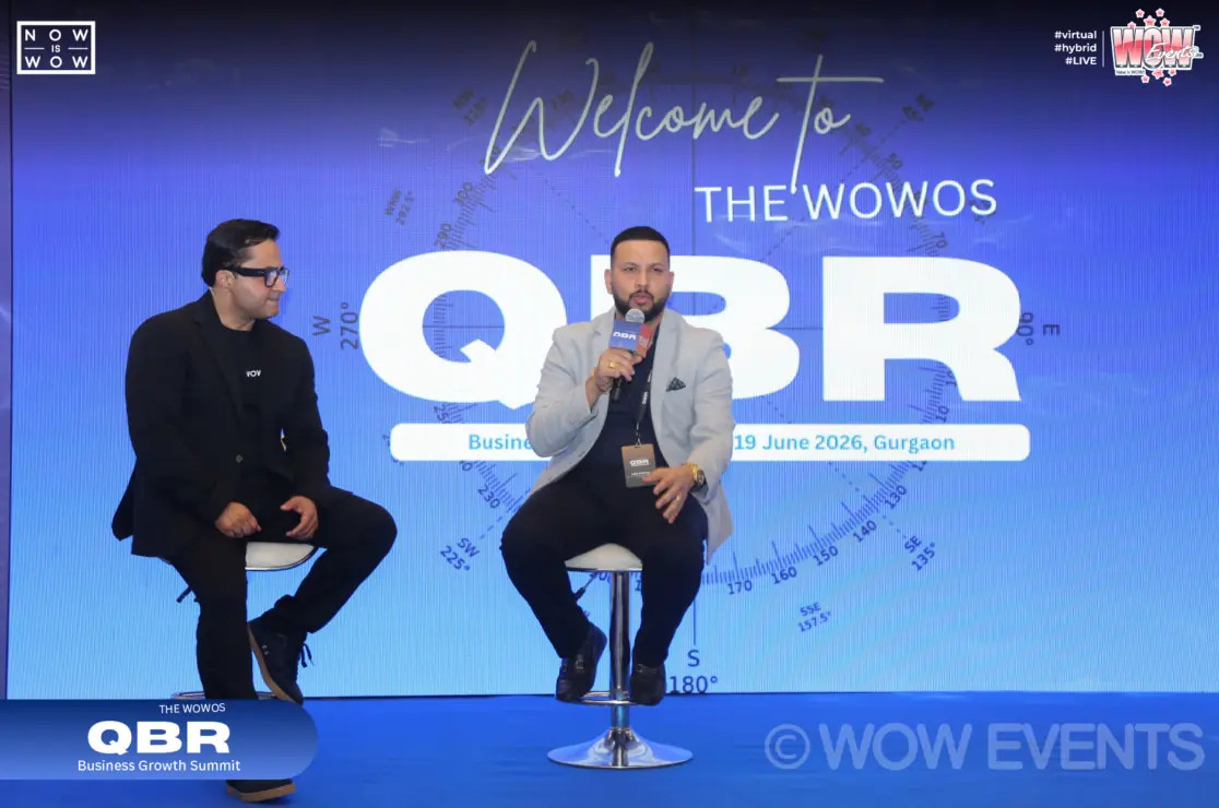 Welcome to The WOWOS QBR, panel on stage