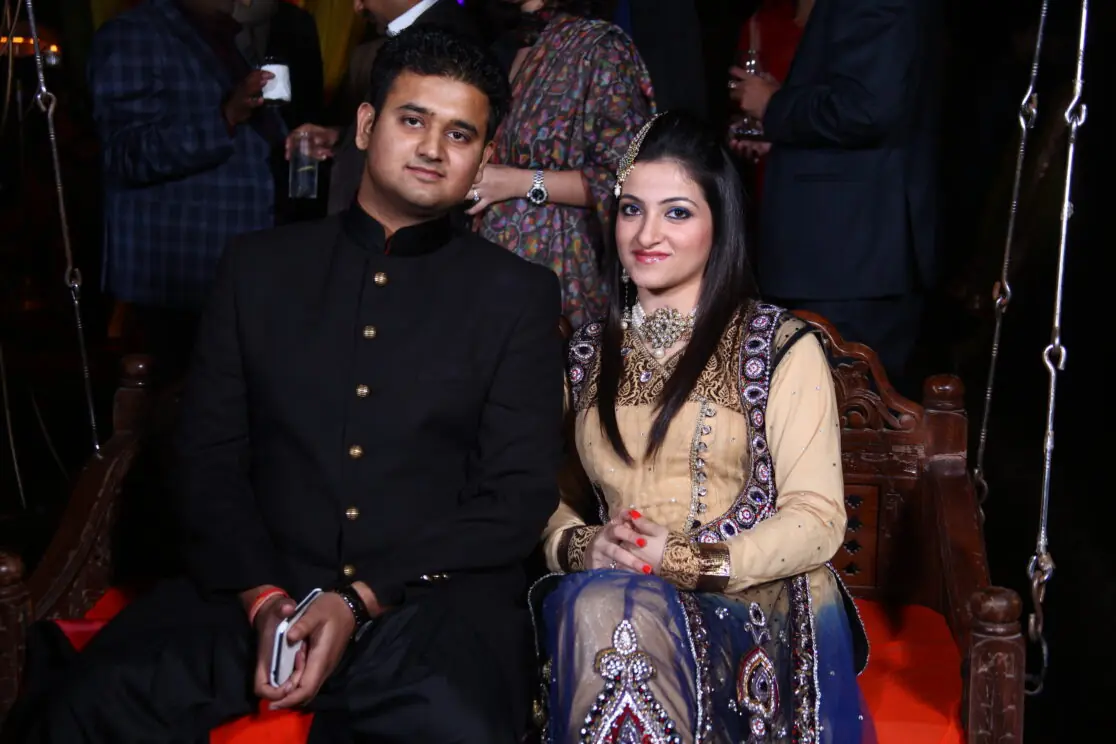 Couple posing at the Nijhon's cocktail wedding