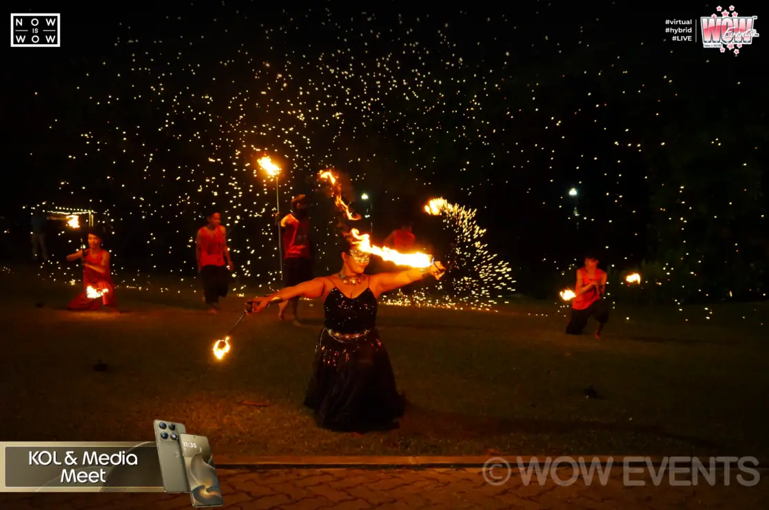 Fire dancer performing on the beach at the Motorola media meet