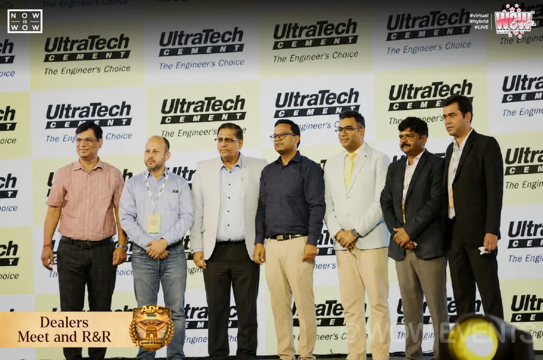 UltraTech dealers meet executives posing on stage