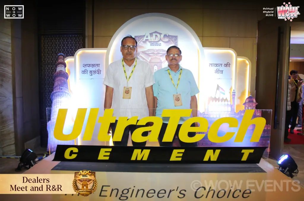 UltraTech Cement dealers meet guests by UltraTech logo