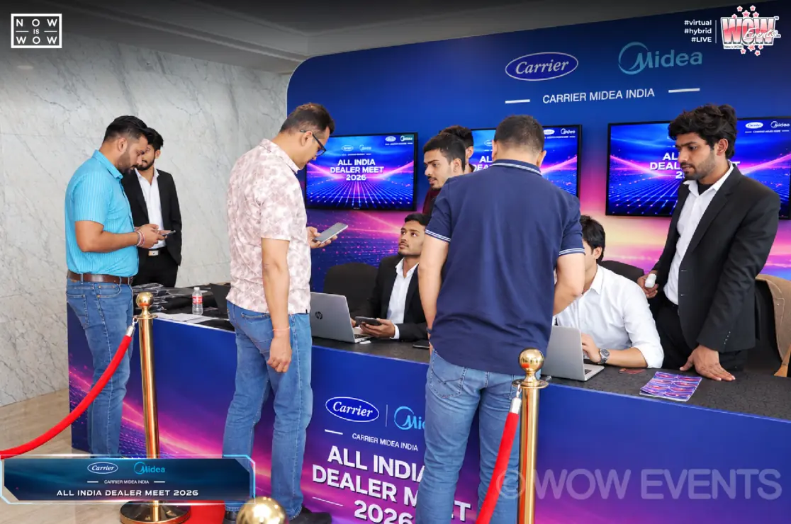 Guests registering at the Carrier Midea dealer meet desk