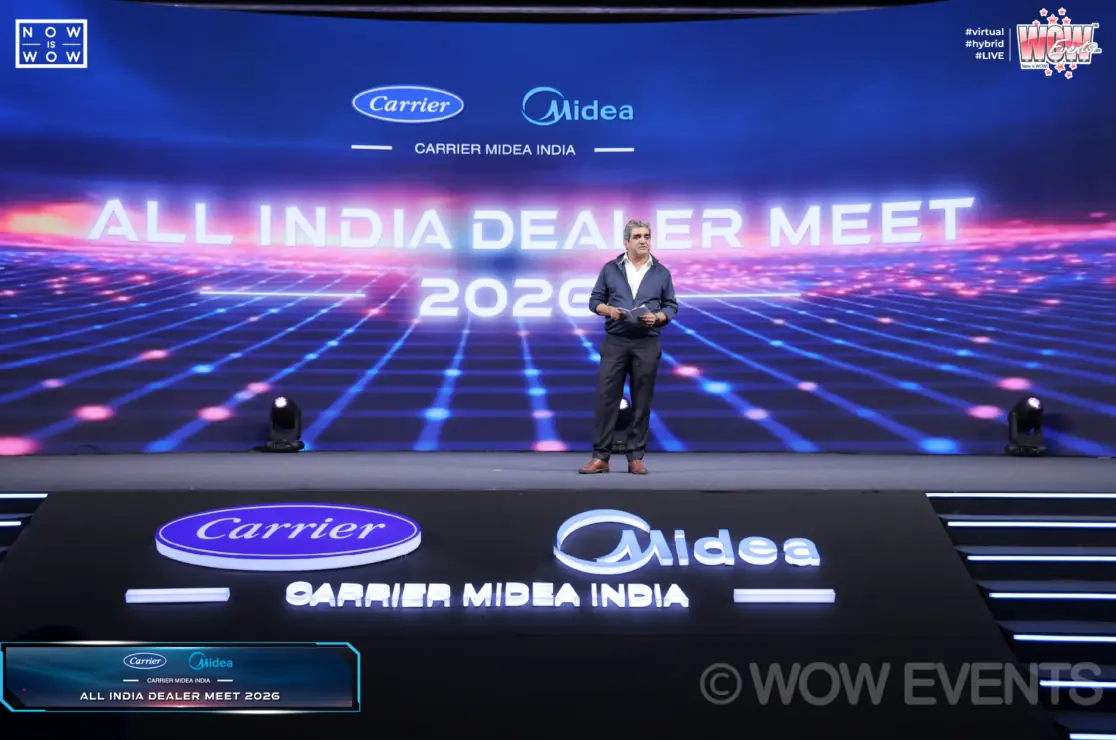 Speaker on the All India Dealer Meet 2026 stage for Carrier Midea