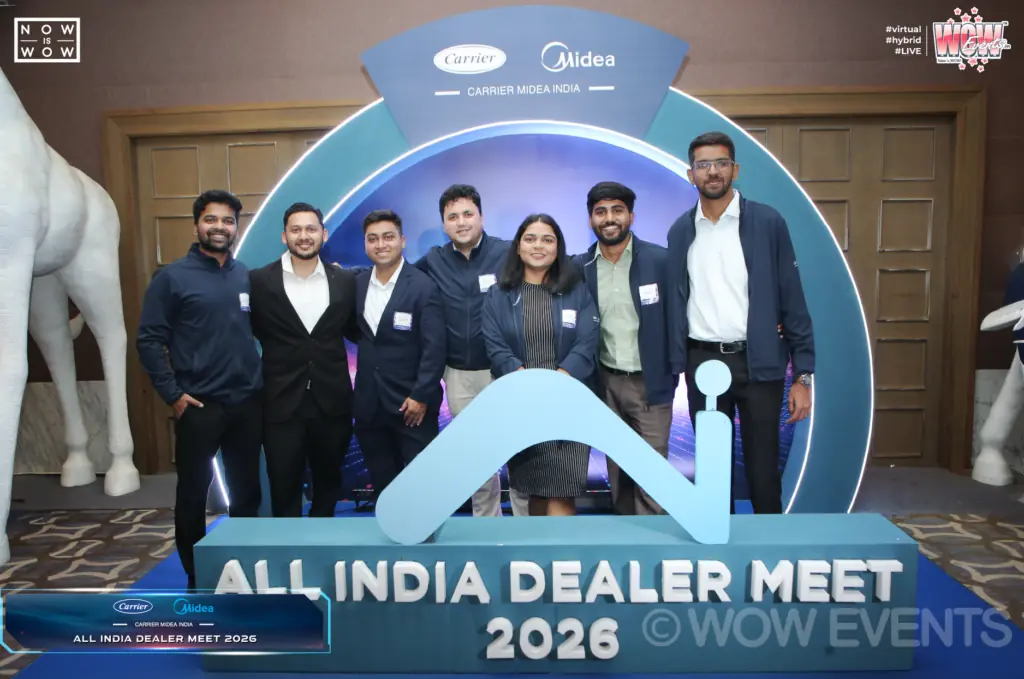 Guests at the All India Dealer Meet 2026 photo booth