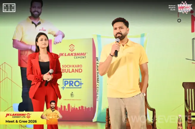 JK Lakshmi Cement meet and greet, cricketer speaking on stage