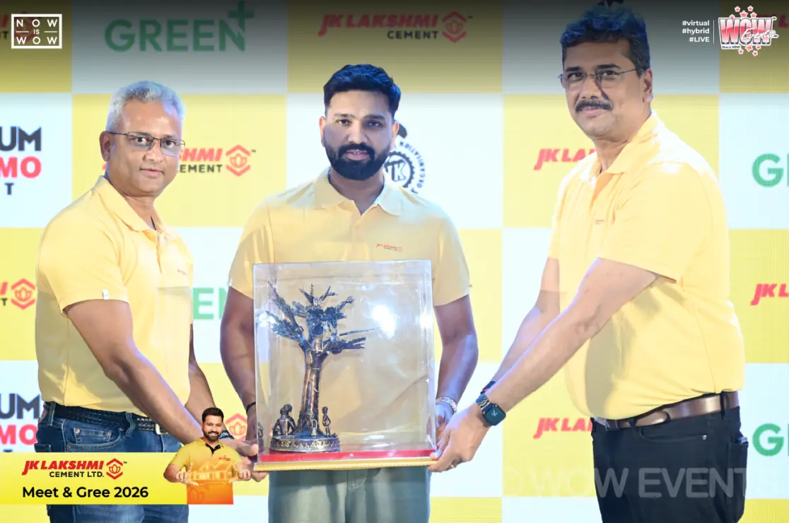 Cricketer receiving a trophy at JK Lakshmi Cement meet and greet in Raipur