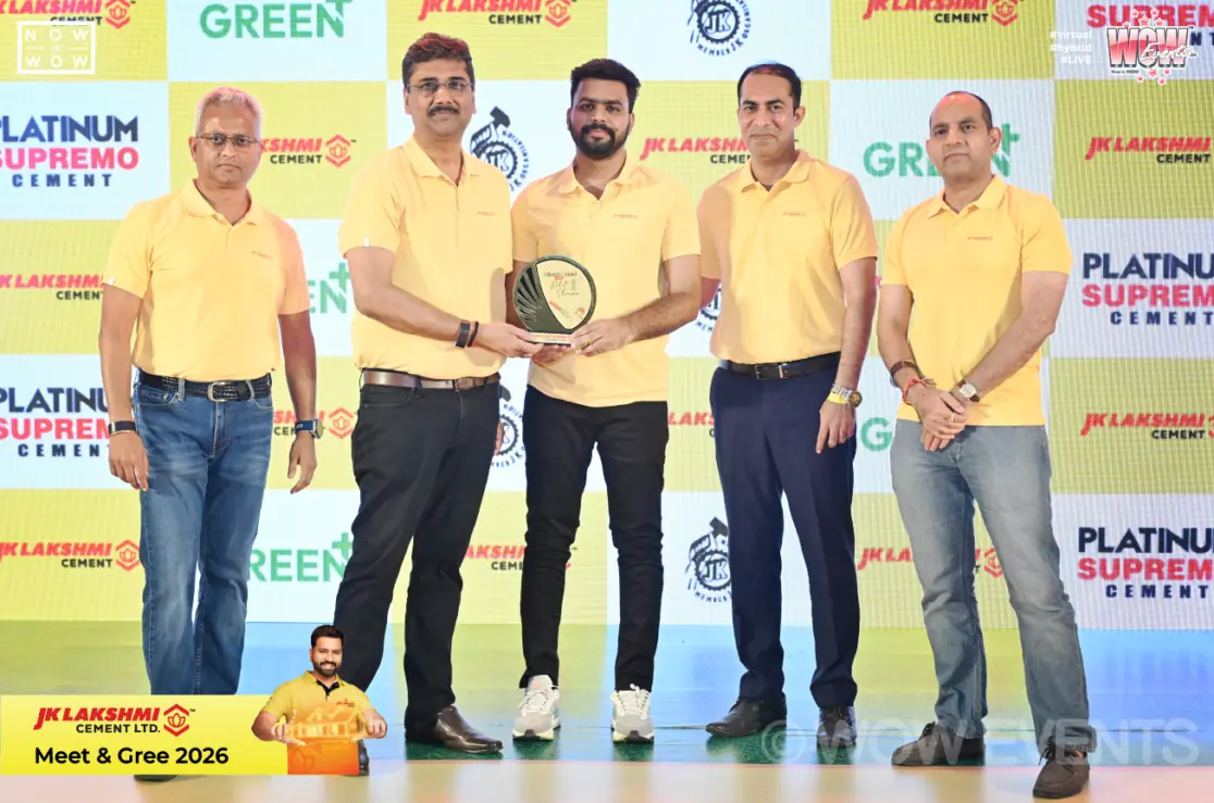 Award presentation on stage at JK Lakshmi Cement meet and greet in Raipur