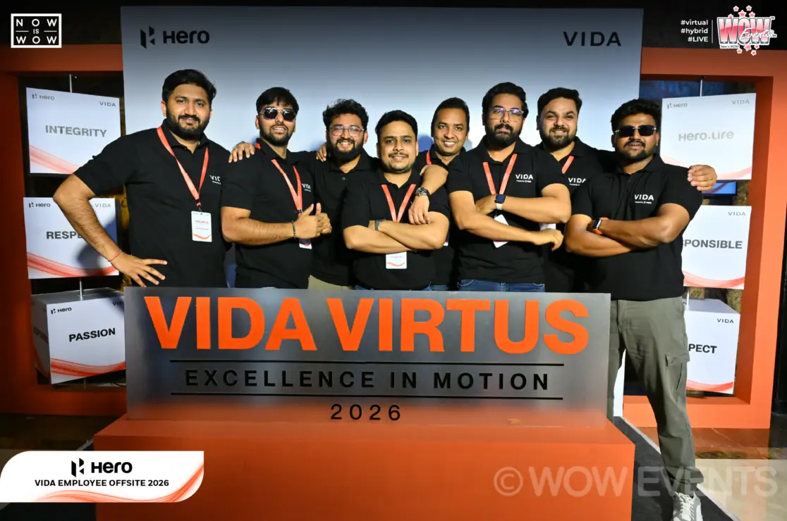 Hero Vida team behind the Vida Virtus 2026 sign
