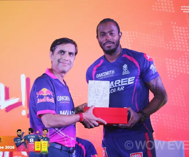 JK Lakshmi Cement IPL meet, cricketer receiving a gift on stage