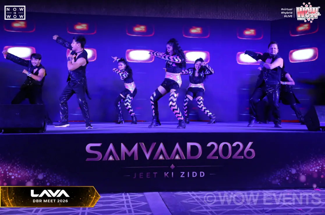 Dancers performing under purple lights at Lava Samvaad 2026