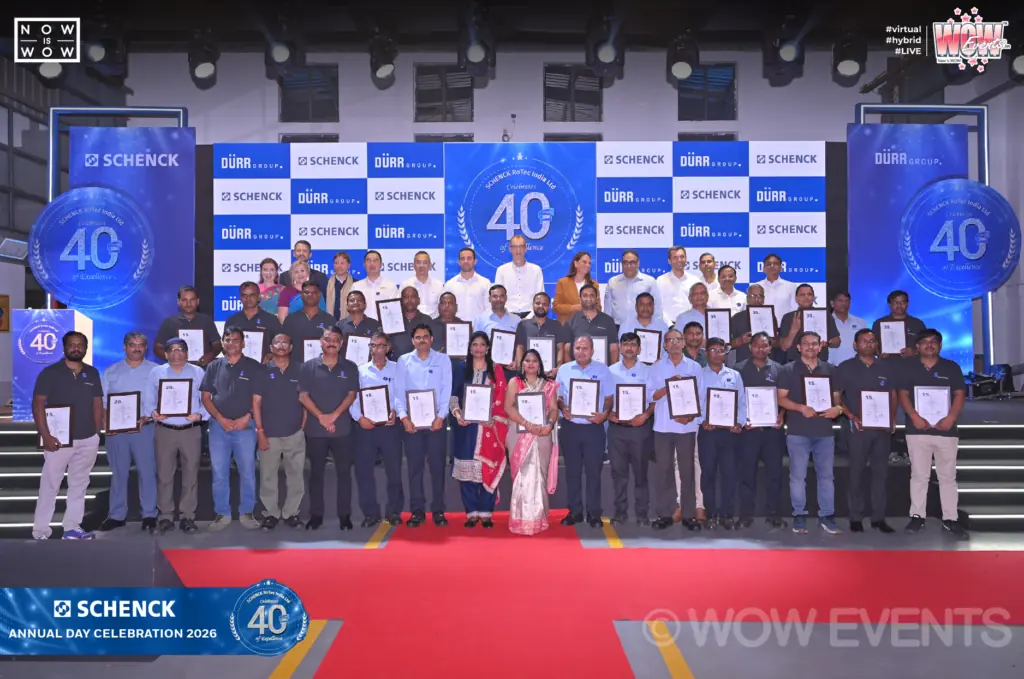 Schenck-12 Schenck 40 years annual day group photo on stage with certificates