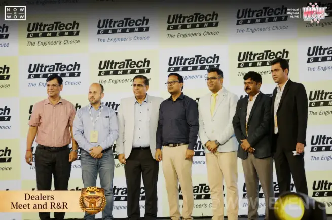 UltraTech ADC dealers meet guests on stage in front of branded backdrop